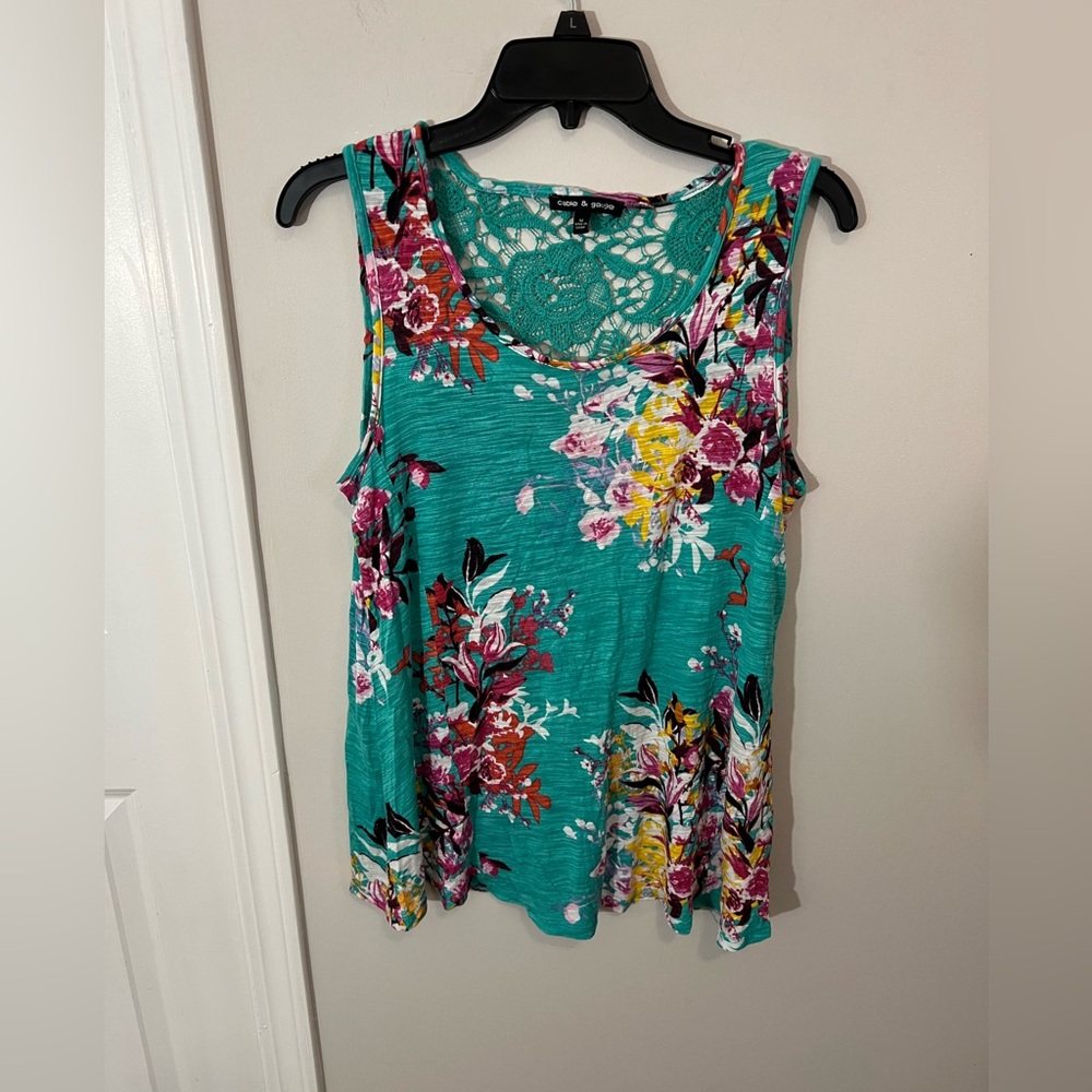 Cable & Gauge sleeveless top with a floral print and a crochet back